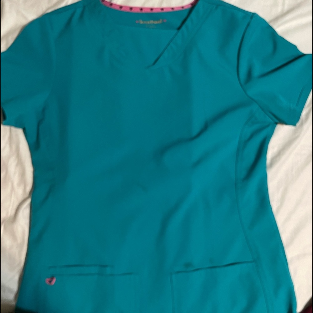 Gently used turquoise scrubs